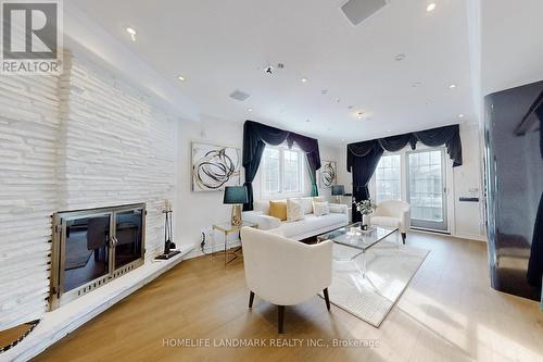 18 Olsen Drive, Toronto, ON - Indoor Photo Showing Living Room With Fireplace