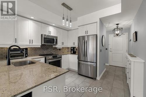 303 - 85 East Liberty Street, Toronto, ON - Indoor Photo Showing Kitchen With Upgraded Kitchen