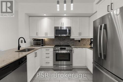 303 - 85 East Liberty Street, Toronto, ON - Indoor Photo Showing Kitchen With Upgraded Kitchen