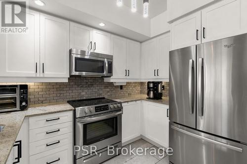 303 - 85 East Liberty Street, Toronto, ON - Indoor Photo Showing Kitchen With Upgraded Kitchen