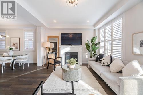 619 Beam Court, Milton, ON - Indoor Photo Showing Living Room With Fireplace