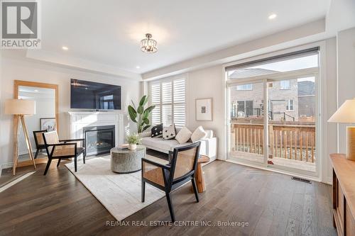 619 Beam Court, Milton, ON - Indoor Photo Showing Living Room With Fireplace