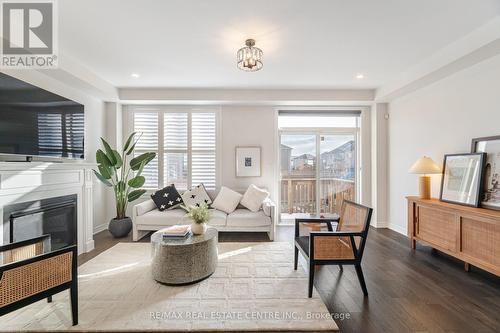 619 Beam Court, Milton, ON - Indoor Photo Showing Living Room With Fireplace