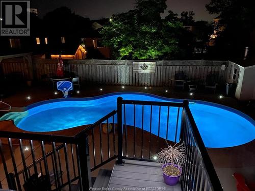 219 Beechwood Drive, Lakeshore, ON - Outdoor With In Ground Pool With Backyard