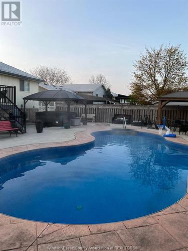 219 Beechwood Drive, Lakeshore, ON - Outdoor With In Ground Pool