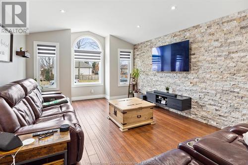 219 Beechwood Drive, Lakeshore, ON - Indoor Photo Showing Living Room With Fireplace