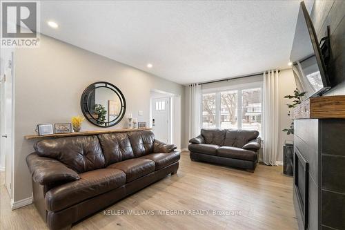 2434 Ogilvie Road, Ottawa, ON - Indoor Photo Showing Living Room With Fireplace