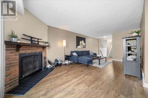 6391 Nuggett Drive E, Ottawa, ON - Indoor Photo Showing Living Room With Fireplace