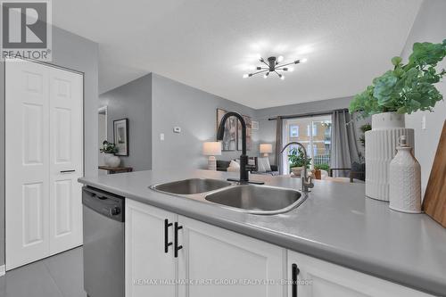 109 - 120 Aspen Springs Drive, Clarington, ON - Indoor Photo Showing Kitchen With Double Sink