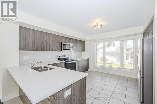 256 Law Drive, Guelph (Grange Hill East), ON - Indoor Photo Showing Kitchen With Stainless Steel Kitchen With Double Sink With Upgraded Kitchen