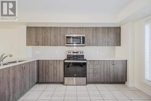 256 Law Drive, Guelph (Grange Hill East), ON - Indoor Photo Showing Kitchen With Double Sink