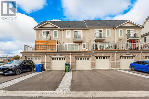 256 Law Drive, Guelph (Grange Hill East), ON - Outdoor With Balcony With Facade