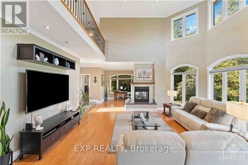 6163 Elkwood Drive, Ottawa, ON - Indoor Photo Showing Living Room With Fireplace