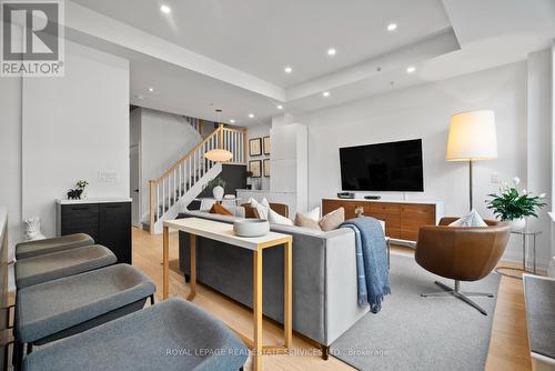 208 - 2 Bellefair Avenue, Toronto, ON - Indoor Photo Showing Living Room