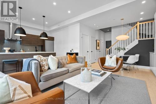 208 - 2 Bellefair Avenue, Toronto, ON - Indoor Photo Showing Living Room