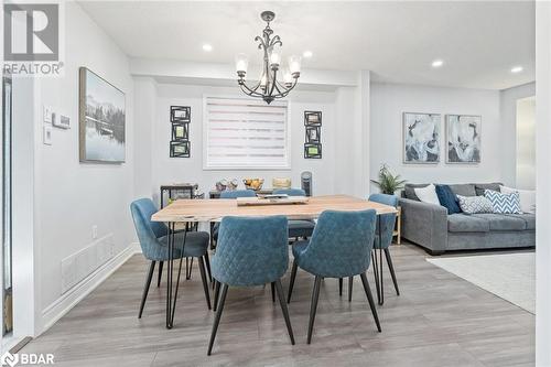 Dining space with a notable chandelier - 50 Smith Drive, Georgetown, ON - Indoor