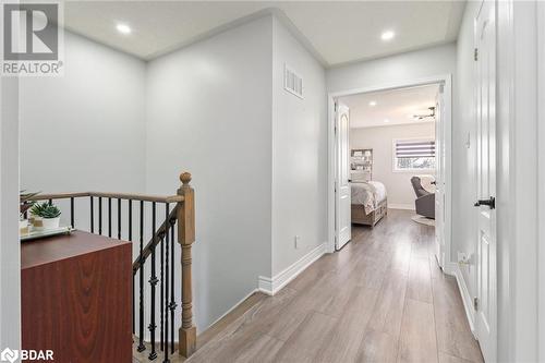 Hallway with light wood-type flooring - 50 Smith Drive, Georgetown, ON - Indoor Photo Showing Other Room