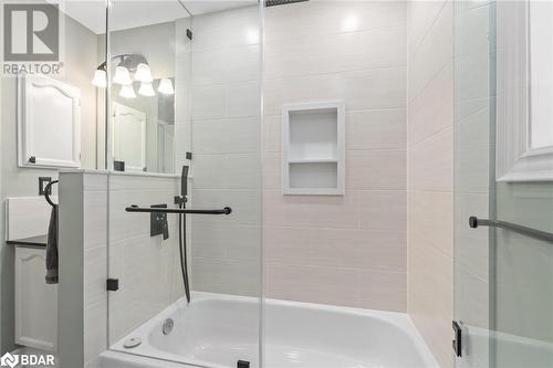 Bathroom featuring enclosed tub / shower combo - 50 Smith Drive, Georgetown, ON - Indoor Photo Showing Bathroom