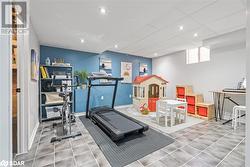 Exercise room with tile patterned floors - 