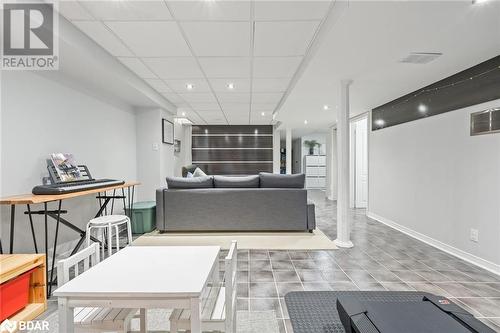 Living room featuring a drop ceiling - 50 Smith Drive, Georgetown, ON - Indoor