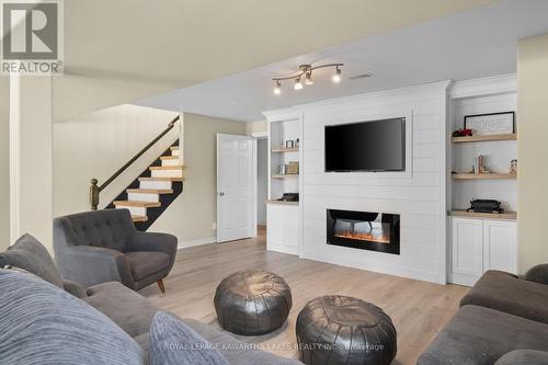 9 Susan Court, Kawartha Lakes (Lindsay), ON - Indoor Photo Showing Living Room With Fireplace