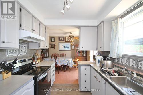 3159 8Th Line Road E, Ottawa, ON - Indoor Photo Showing Kitchen With Double Sink