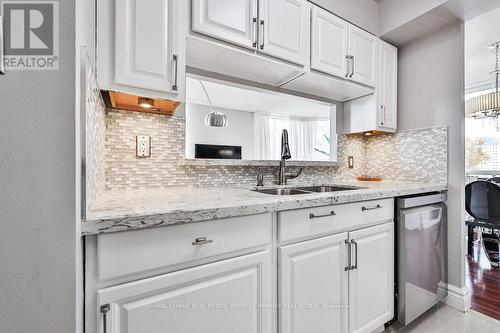 708 - 1 Hickory Tree Road, Toronto, ON - Indoor Photo Showing Kitchen With Double Sink With Upgraded Kitchen