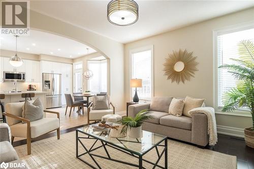 Hardwood Floors and Upgraded Trim - 348 Tonelli Lane, Milton, ON - Indoor Photo Showing Living Room