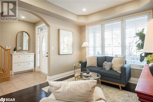 Rounded Corners & Arched Entryways - 348 Tonelli Lane, Milton, ON - Indoor Photo Showing Living Room