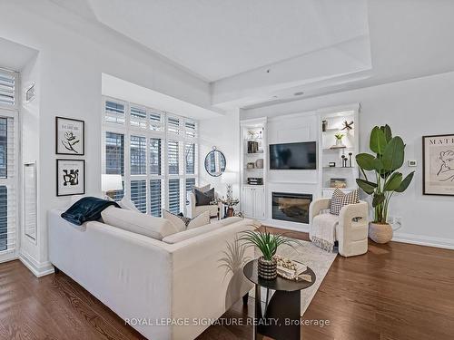 105-85 The Donway  W, Toronto, ON - Indoor Photo Showing Living Room With Fireplace