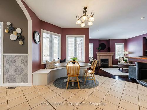 2 Mt Haven Cres, East Luther Grand Valley, ON - Indoor Photo Showing Dining Room With Fireplace