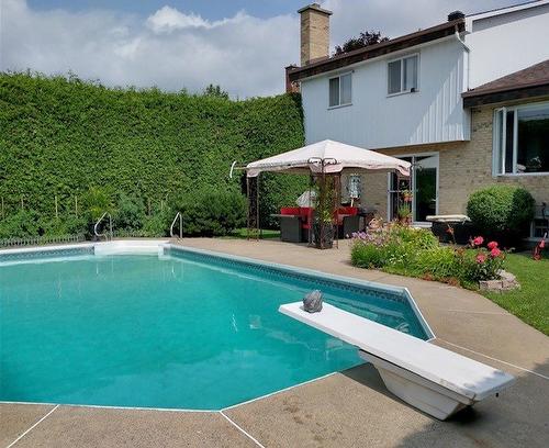 Backyard - 2604 Rue De Vigny, Mascouche, QC - Outdoor With In Ground Pool