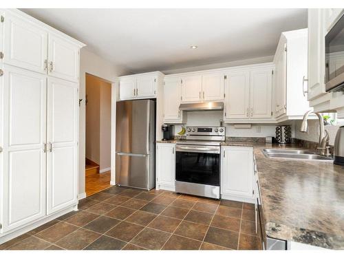 Kitchen - 2604 Rue De Vigny, Mascouche, QC - Indoor Photo Showing Kitchen With Double Sink