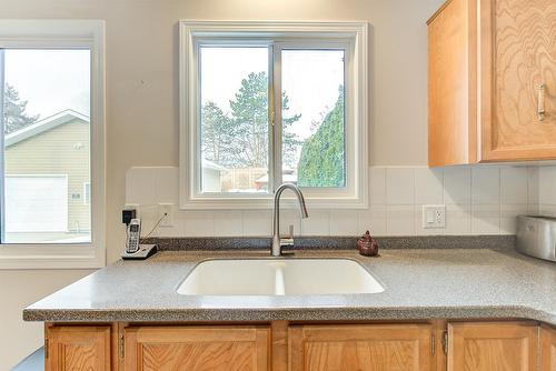 1634 Carshyl Court, Kelowna, BC - Indoor Photo Showing Kitchen With Double Sink