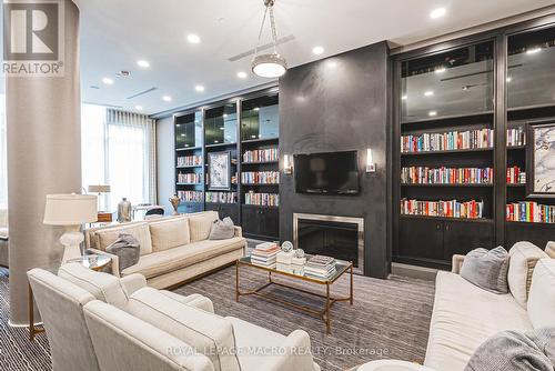 503 - 11 Bronte Road, Oakville, ON - Indoor Photo Showing Living Room With Fireplace