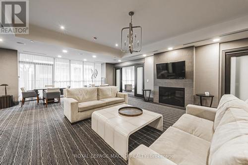 503 - 11 Bronte Road, Oakville, ON - Indoor Photo Showing Living Room With Fireplace