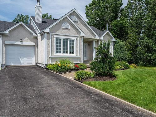 Frontage - 486 Rue De L'Île-De-Mai, Terrebonne (Lachenaie), QC - Outdoor With Facade