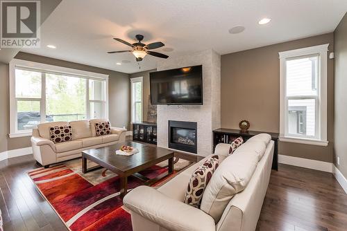 1212 Orizaba Court, Prince George, BC - Indoor Photo Showing Living Room With Fireplace