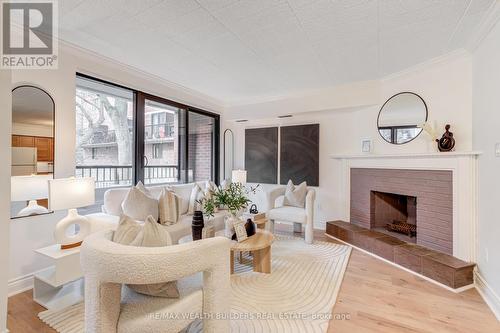 37 - 17 Pembroke Street W, Toronto, ON - Indoor Photo Showing Living Room With Fireplace