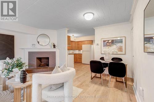 37 - 17 Pembroke Street W, Toronto, ON - Indoor Photo Showing Living Room With Fireplace