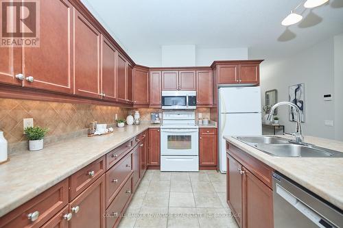 76 Aaron Trail, Welland (766 - Hwy 406/Welland), ON - Indoor Photo Showing Kitchen With Double Sink