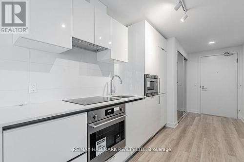 2411 - 230 Simcoe Street, Toronto, ON - Indoor Photo Showing Kitchen With Upgraded Kitchen