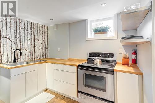 63 Fortieth Street, Toronto, ON - Indoor Photo Showing Kitchen With Double Sink