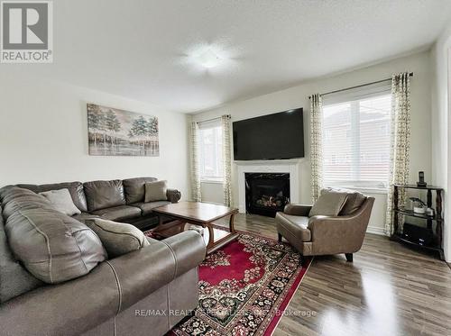 4 Vernosa Drive, Brampton, ON - Indoor Photo Showing Living Room With Fireplace