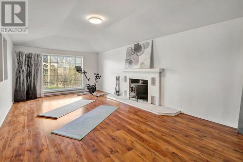 Flex Space/Family Room - 15091 Oyama Road, Lake Country, BC - Indoor Photo Showing Other Room With Fireplace