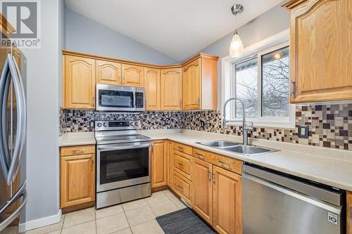 526 Clayton Crescent, Kelowna, BC - Indoor Photo Showing Kitchen With Double Sink