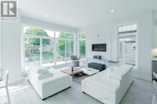 29 Sauble River Road, Lambton Shores (Grand Bend), ON - Indoor Photo Showing Living Room With Fireplace