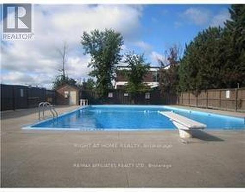 106C - 2041 Arrowsmith Drive, Ottawa, ON - Outdoor With In Ground Pool With Backyard