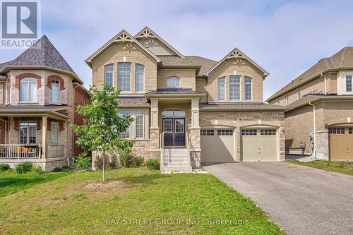 10 Rugman Crescent, Springwater, ON - Outdoor With Facade