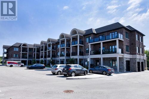 203 - 2605 Binbrook Road, Hamilton, ON - Outdoor With Balcony With Facade